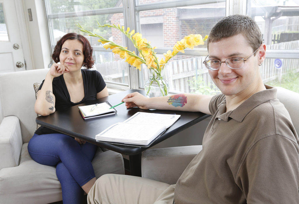 Photo of Gleb Tsipursky with his wife and business partner, Agnes Vishnevkin (Photo by Adam Cairns, The Columbus Dispatch)